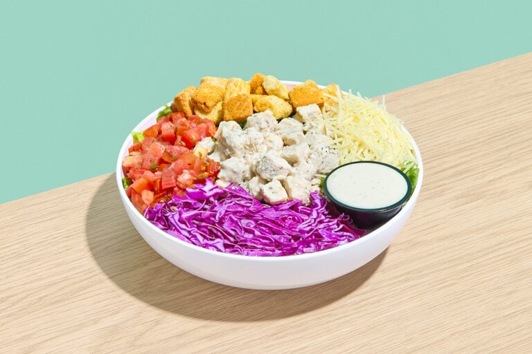 Chicken Caesar Salad — Chicken Breast, Romaine, Purple Cabbage, Croutons, Pico de Gallo, Parmesan Cheese, Caesar Dressing