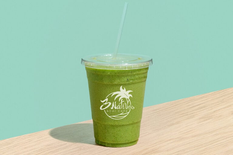 Fresh green smoothie in takeaway cup from 3 Natives Acai Cafe