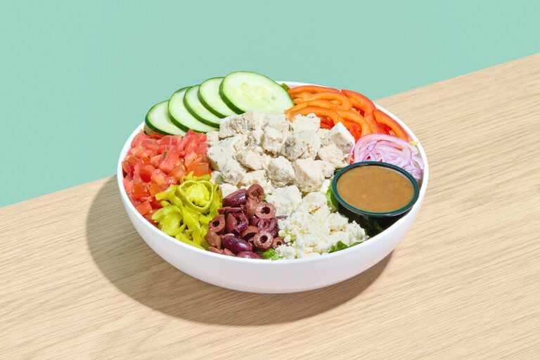 Greek Salad — Chicken Breast, Romaine, Cucumber, Red Onion, Red Pepper, Pico de Gallo, Kalamata Olives, Pepperoncini, Feta Cheese, Balsamic Dressing