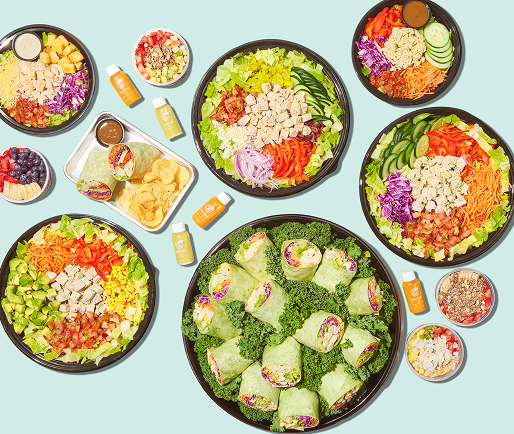 Spread of 3Natives catering salads, bowls, wraps and juices